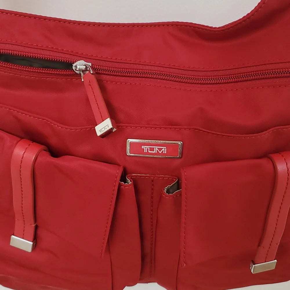 Tumi Pucket E/W Flap Crossbody Messenger Bag in Red with Silver Hardware